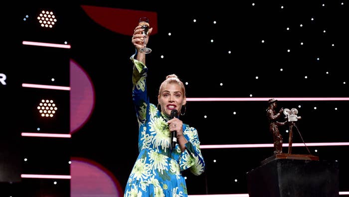 Busy Philipps speaks onstage during the Will Rogers 78th Annual Pioneer Dinner