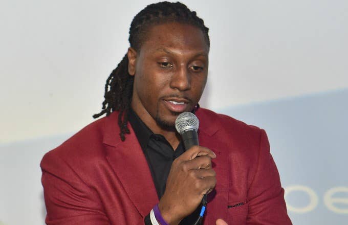 Roddy White speaks at a promotional event.