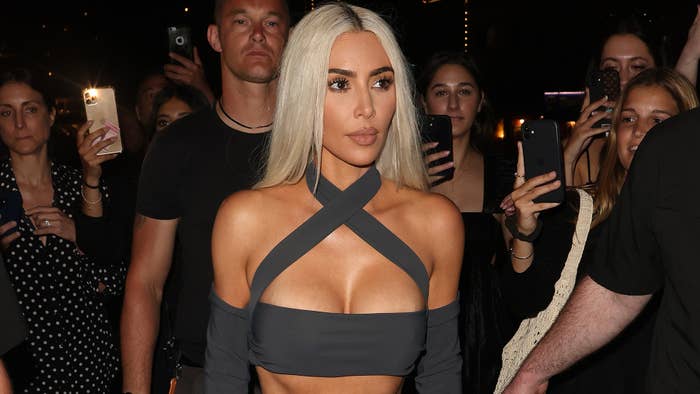 Kim Kardashian is seen among a crowd of people