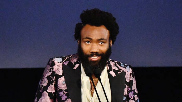 Donald Glover, wearing Gucci, speaks onstage during the 2019 LACMA Art + Film Gala