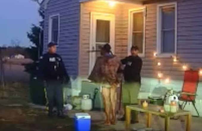 Dashcam video shows cop kicking handcuffed man