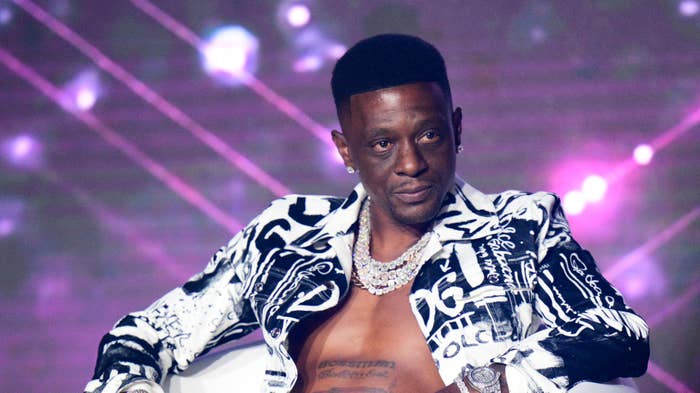 Boosie seated with his chest exposed.