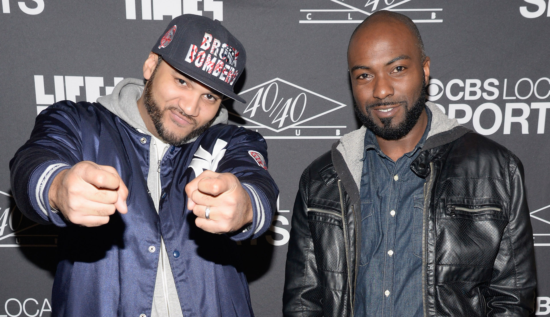 Desus and Mero in 2014 on a red carpet