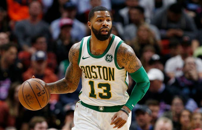 Marcus Morris #13 of the Boston Celtics dribbles with the ball against the Miami Heat