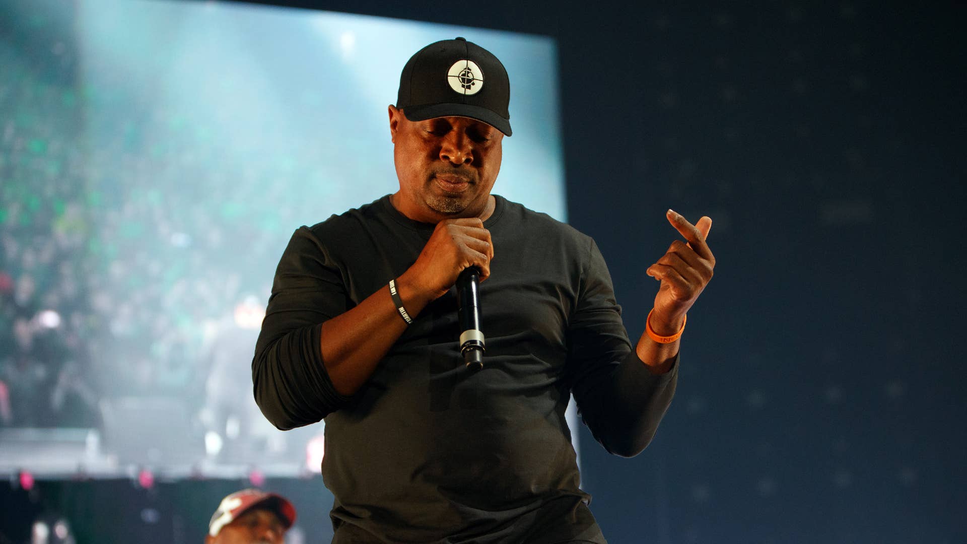 Chuck D performs in front of a crowd.