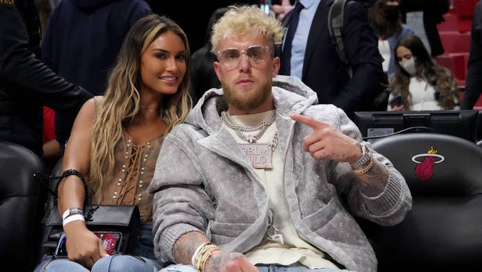 Jake Paul and his girlfriend Julia Rose pose after the game between the Miami Heat and the Detroit Pistons