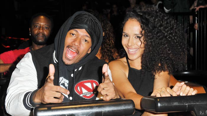 Nick Cannon and Brittany Bell ride the &#x27;Ghostrider&#x27; Roller Coaster.