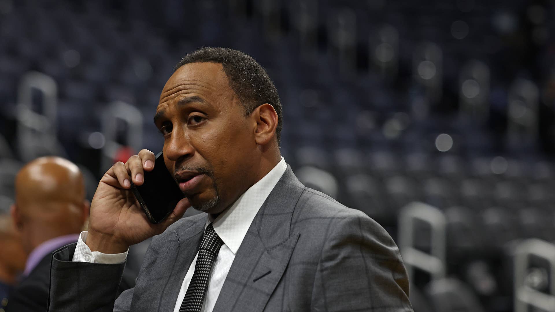 Reporter, Stephen A. Smith talks on his phone during Game Two of the 2022 NBA Finals