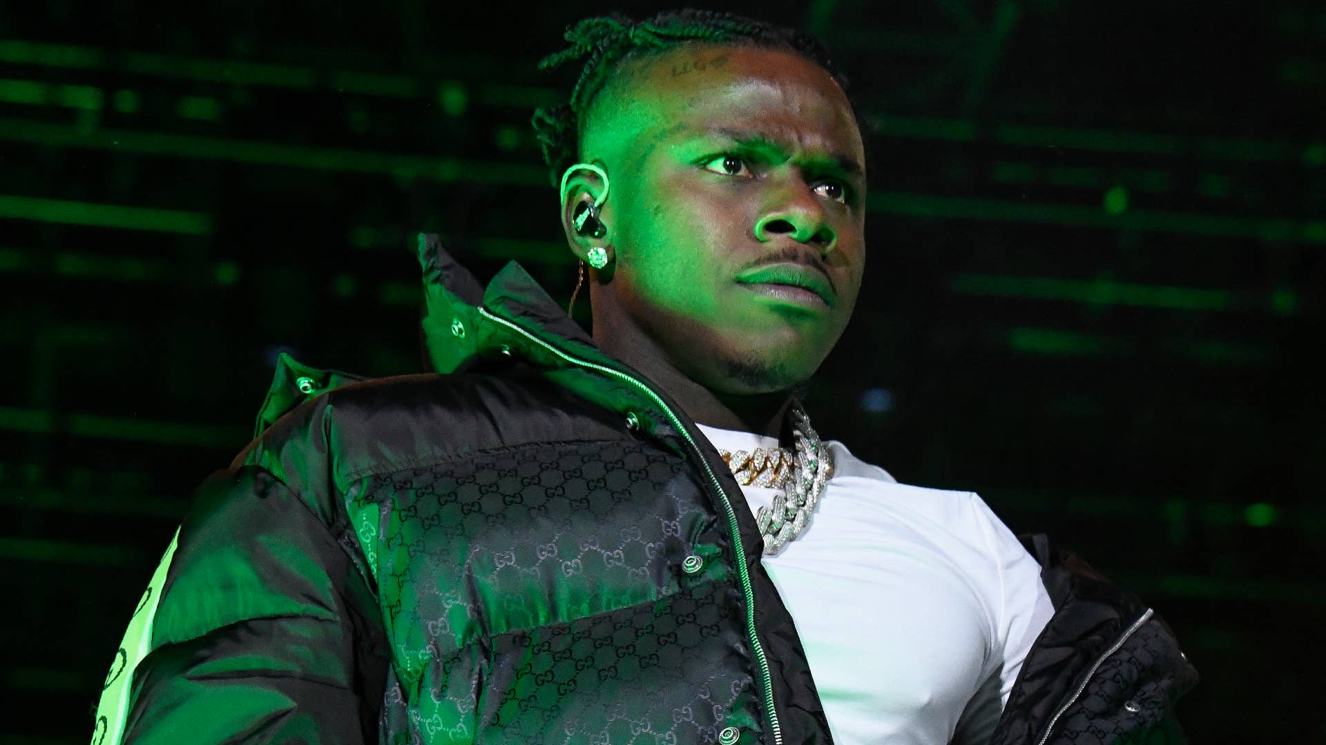 DaBaby appears onstage at a show.