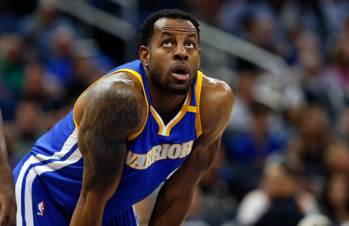 Andre Iguodala puts his hands on his knees during game.