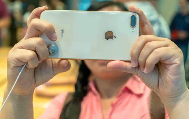 Chinese customers are trying the new iPhone 8 in an Apple store