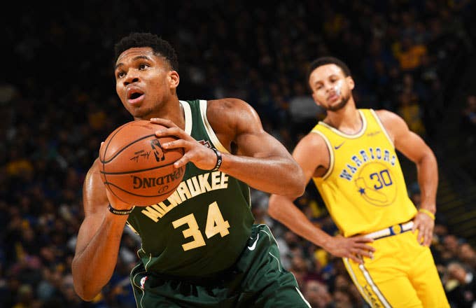 Giannis Antetokounmpo shoots free throws against the Warriors.