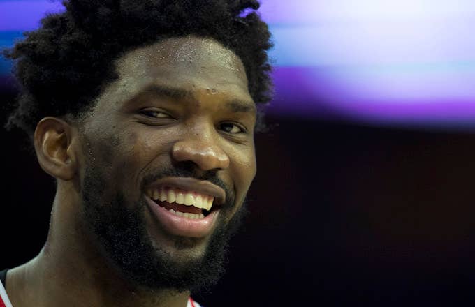Joel Embiid smiles in the third quarter against the Minnesota Timberwolves.