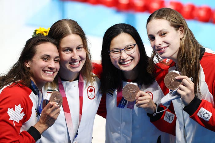 Bronze medalist Kylie Masse, Sydney Pickrem, Margaret Macneil and Penny Oleksiak of Team Canada pose after the medal ceremony for the Women&#x27;s 4 x 100m Medley Relay Final on day nine of the Tokyo 2020 Olympic Games at Tokyo Aquatics Centre on August 01, 2021 in Tokyo, Japan.