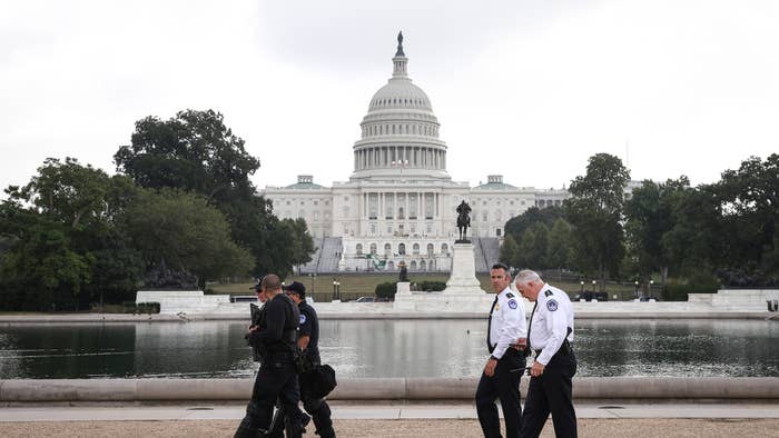 Members of the U.S. Capitol Police, including chief Tom Manger