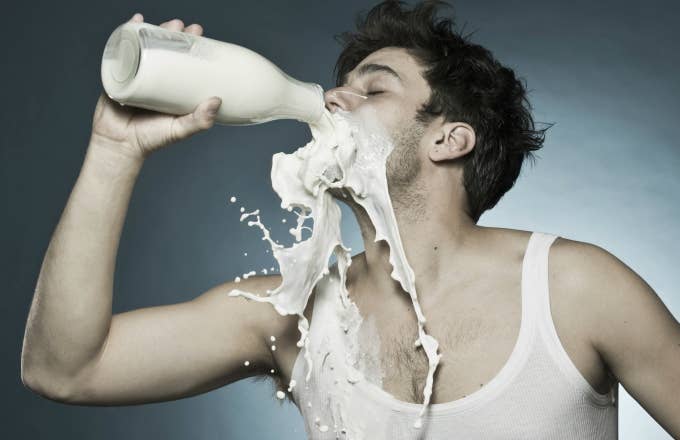 Man drinking milk.
