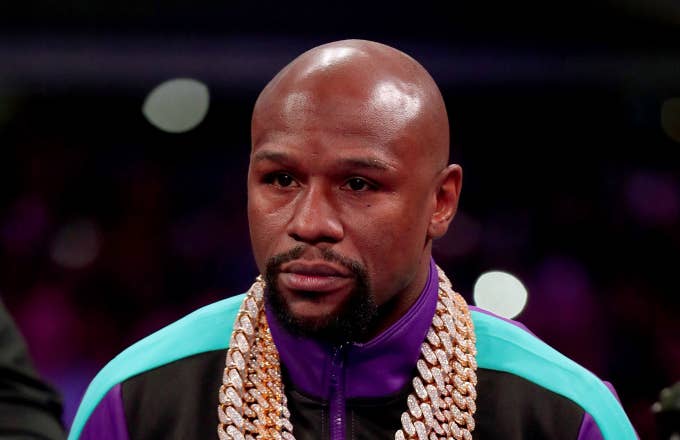 Floyd Mayweather Jr. stands in the ring
