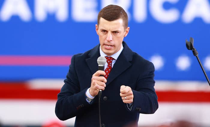 Lee Chatfield speaking onstage at a Donald Trump rally in 2020