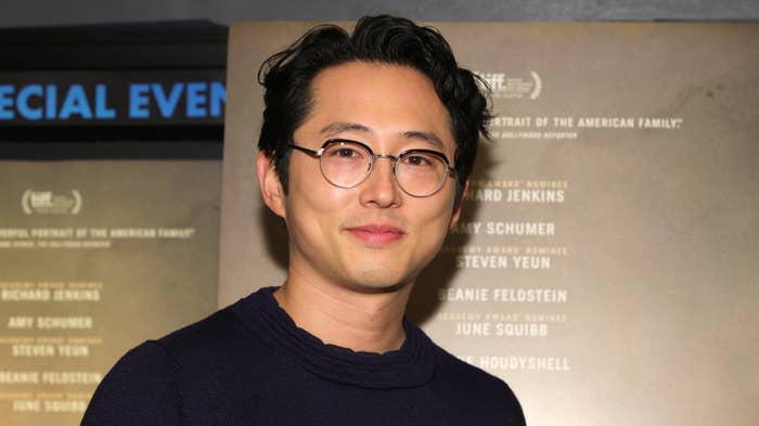 Steven Yeun seen on the red carpet of a movie screening.