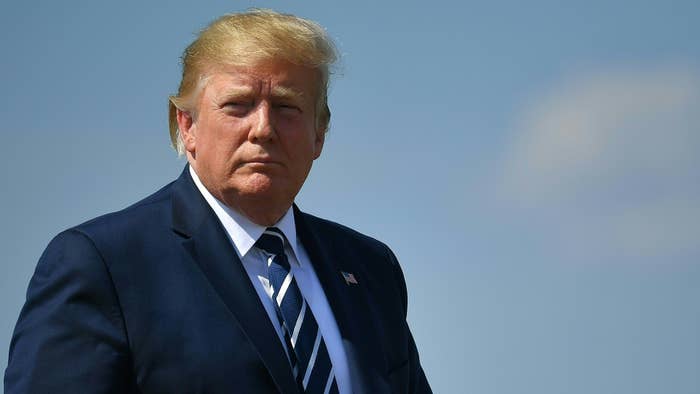 US President Donald Trump makes his way to board Air Force One