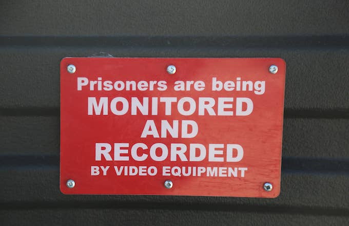 &#x27;Prisoners are being monitored and recorded by video surveillance&#x27; sign