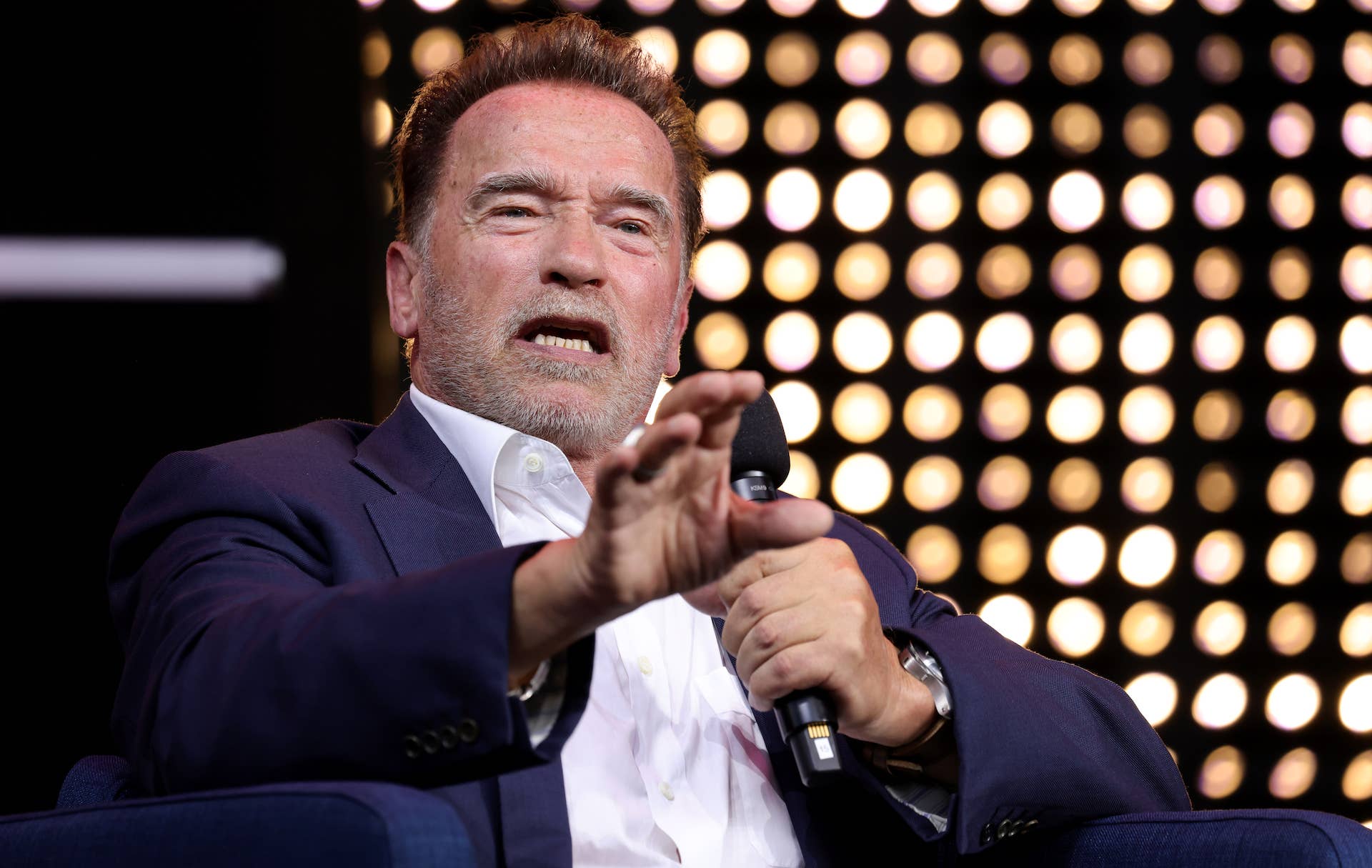 Arnold Schwarzenegger speaks onstage at Digital X event in 2021