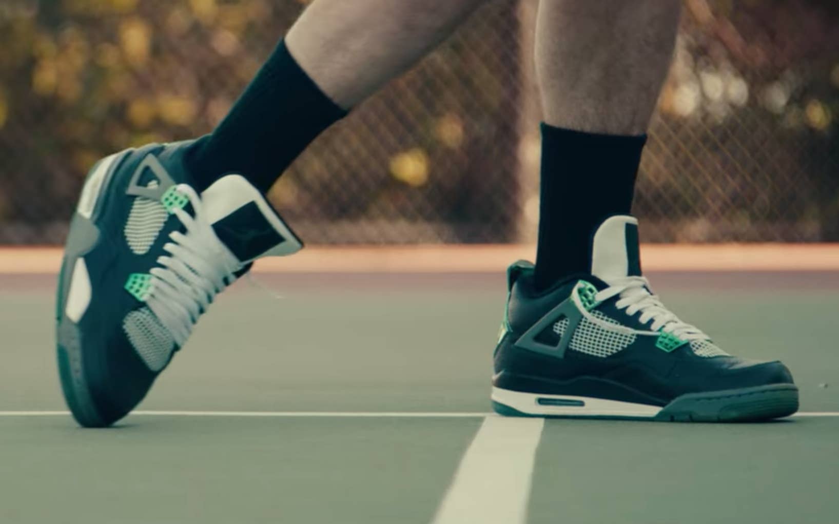 A pair of Oregon Air Jordan 4s gets scuffed in the Netflix show Sneakerheads