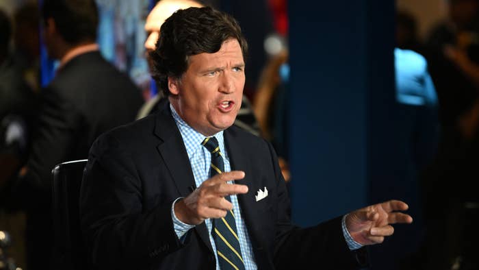 tucker carlson is pictured tuckering