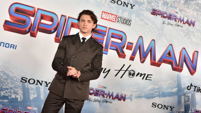 Tom Holland walks the red carpet.