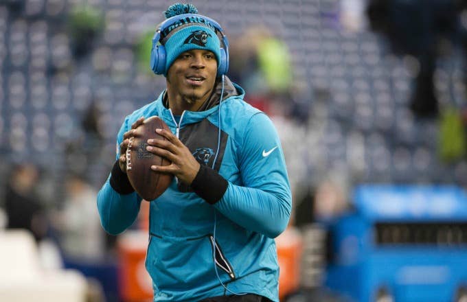 Cam Newton warms up before a game against the Seahawks.