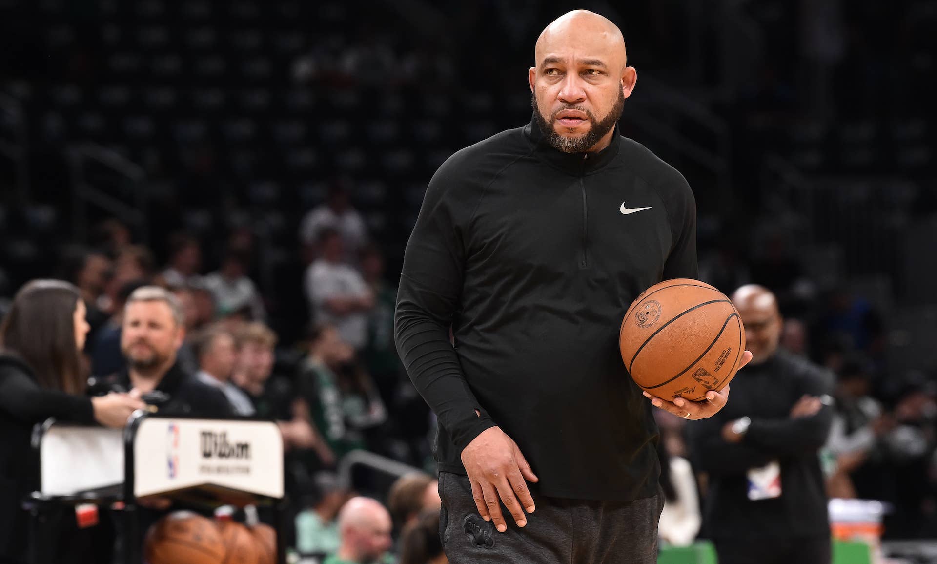 Darvin Ham takes the floor for the Milwaukee Bucks' game against the Boston Celtics