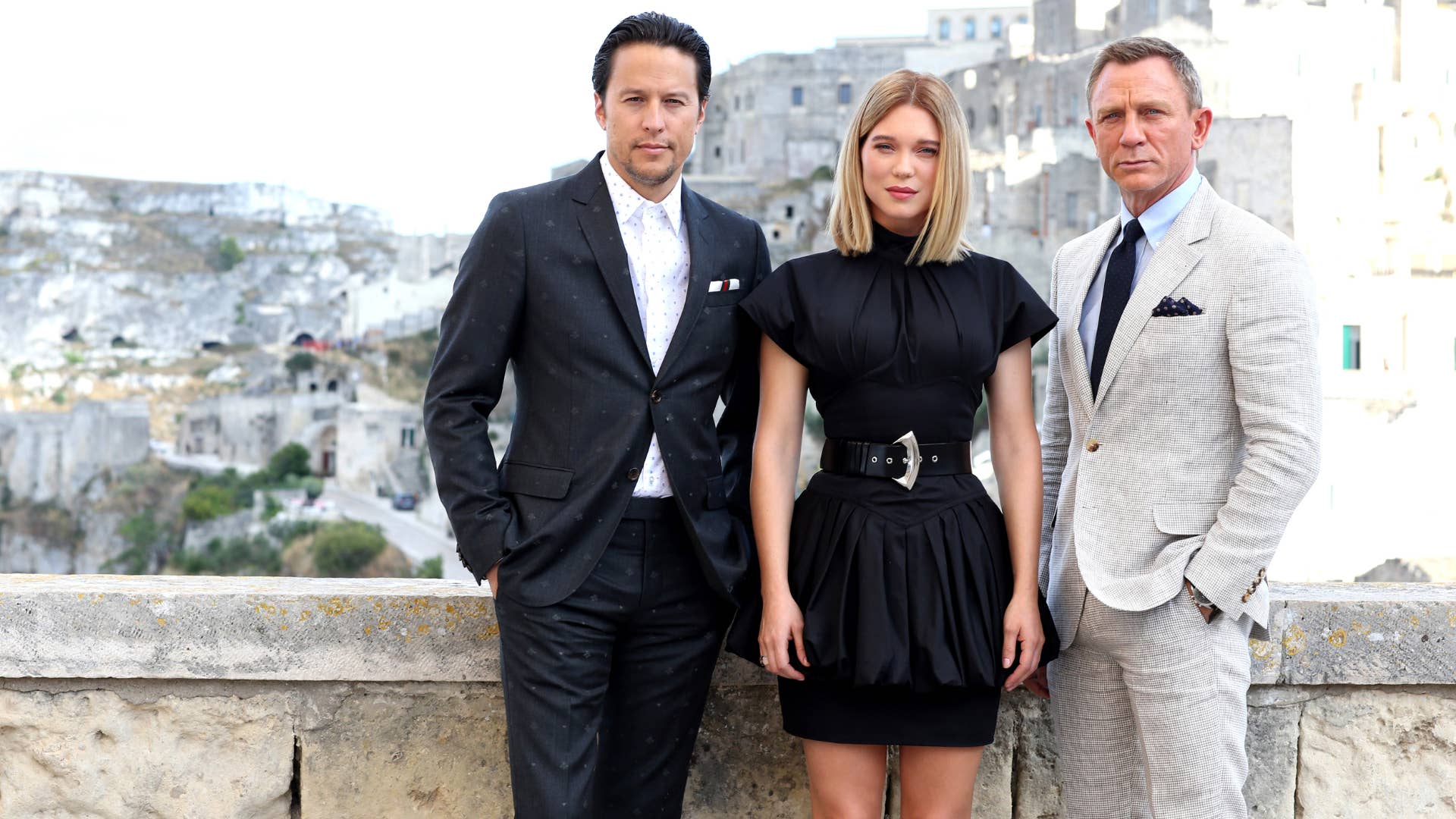 Cary Joji Fukunaga, Léa Seydoux and Daniel Craig pose on set of 'No Time To Die.'
