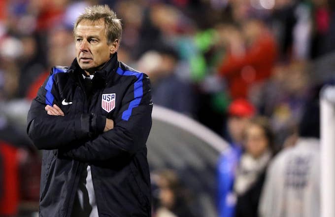 Jurgen Klinsmann crosses his arms for warmth, and getting left out in the cold by the USMNT.