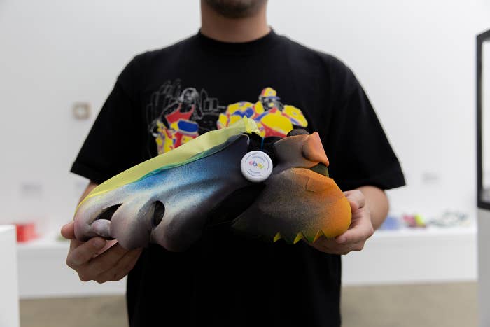 Sneaker designer Cesar Idrobo with the prototype sneaker he created for eBay Australia