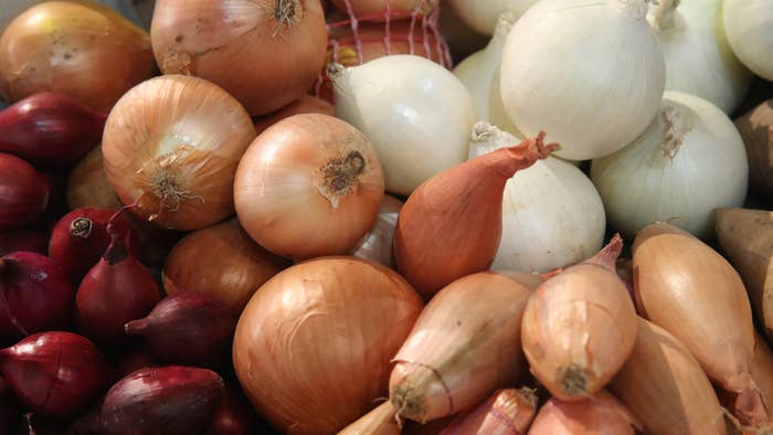 Onions and shallots lie on display at the 2018 International Green Week