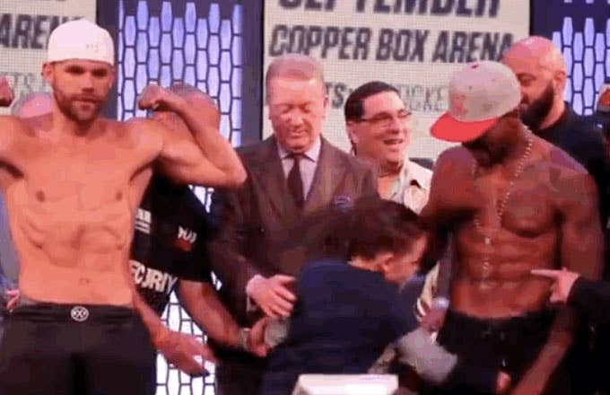 A boxer&#x27;s son punches his oppoent (Willie Monroe Jr.) in the penis at a weigh in.