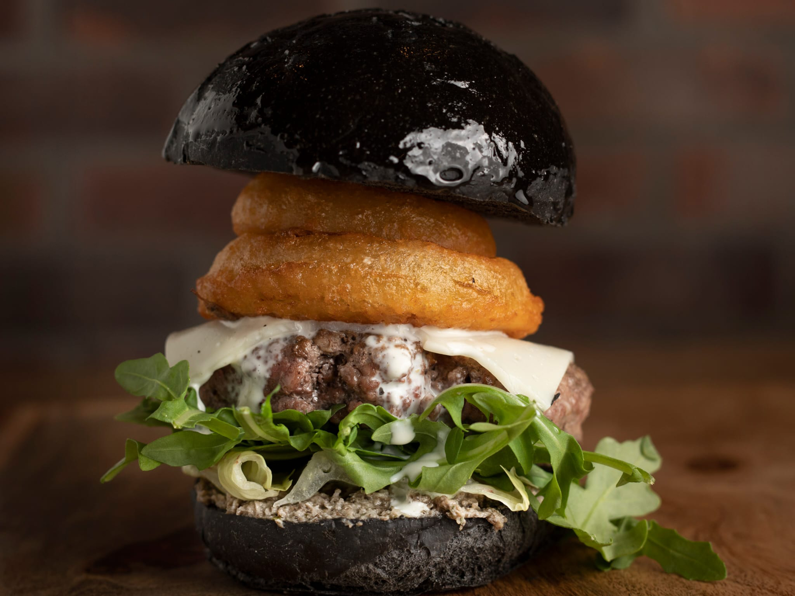 Meat The Bun&#x27;s delectable charcoal bun burger