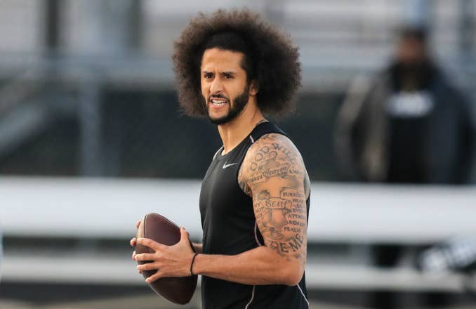 Colin Kaepernick looks to make a pass during a private NFL workout