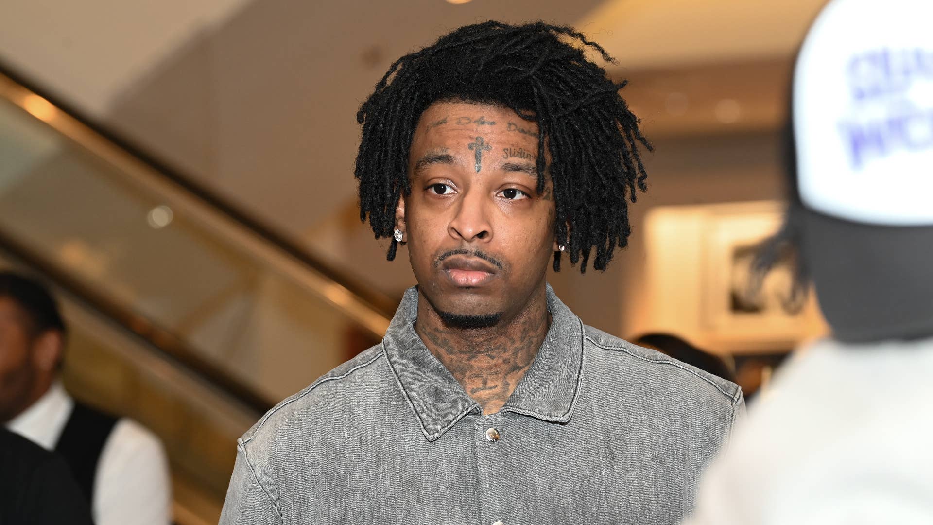 21 Savage shows off his new look