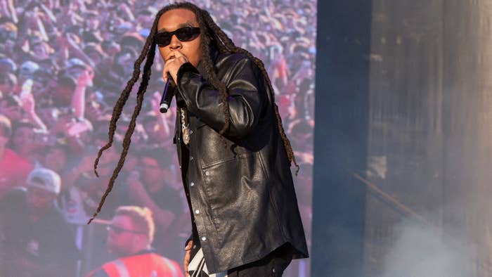 Takeoff is seen performing live at a festival