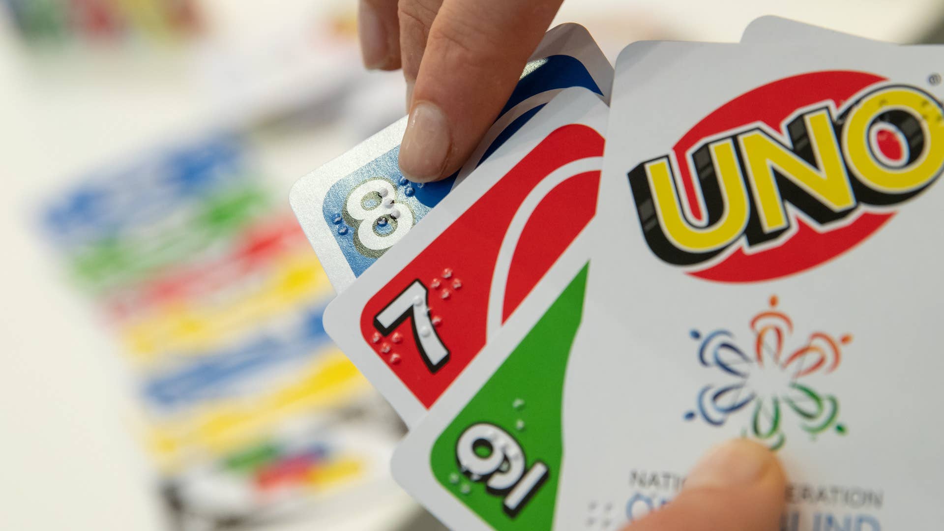 Mattel's Uno Braille card game printed with Braille.