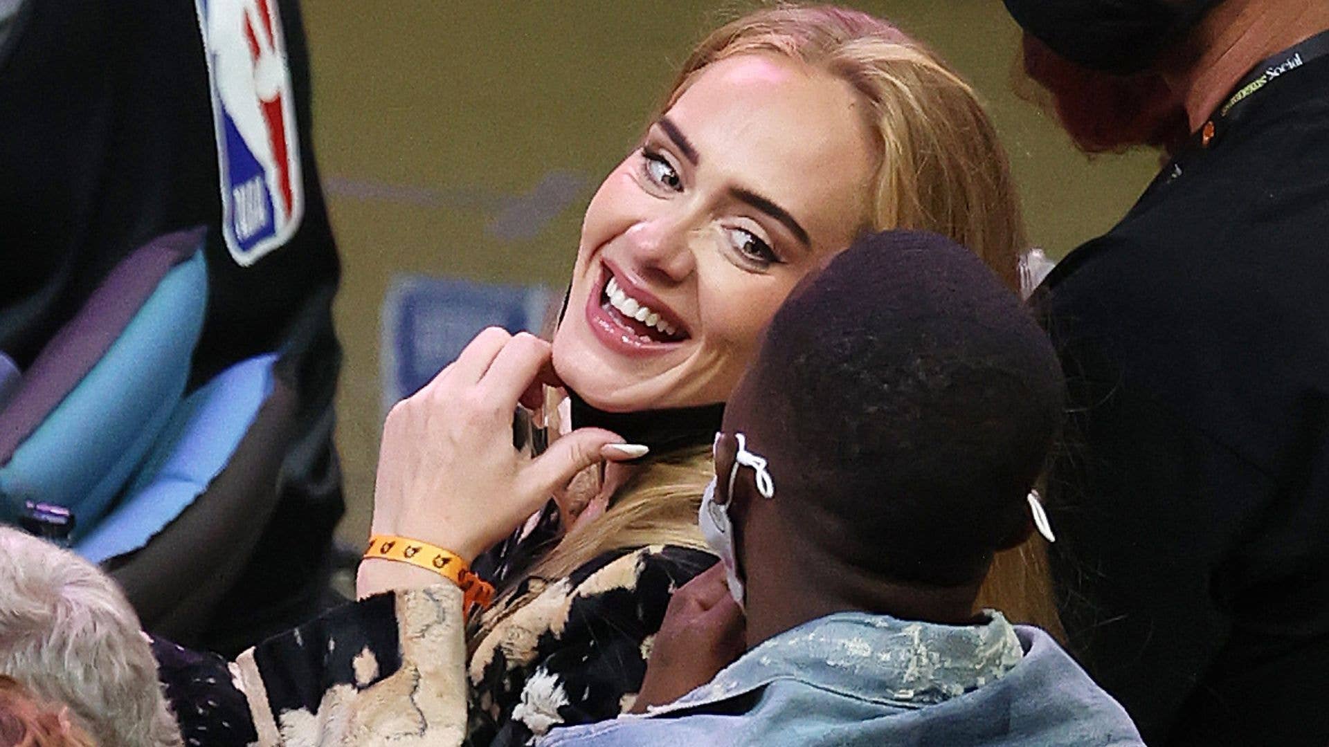 Singer Adele smiles with Rich Paul during the NBA Finals