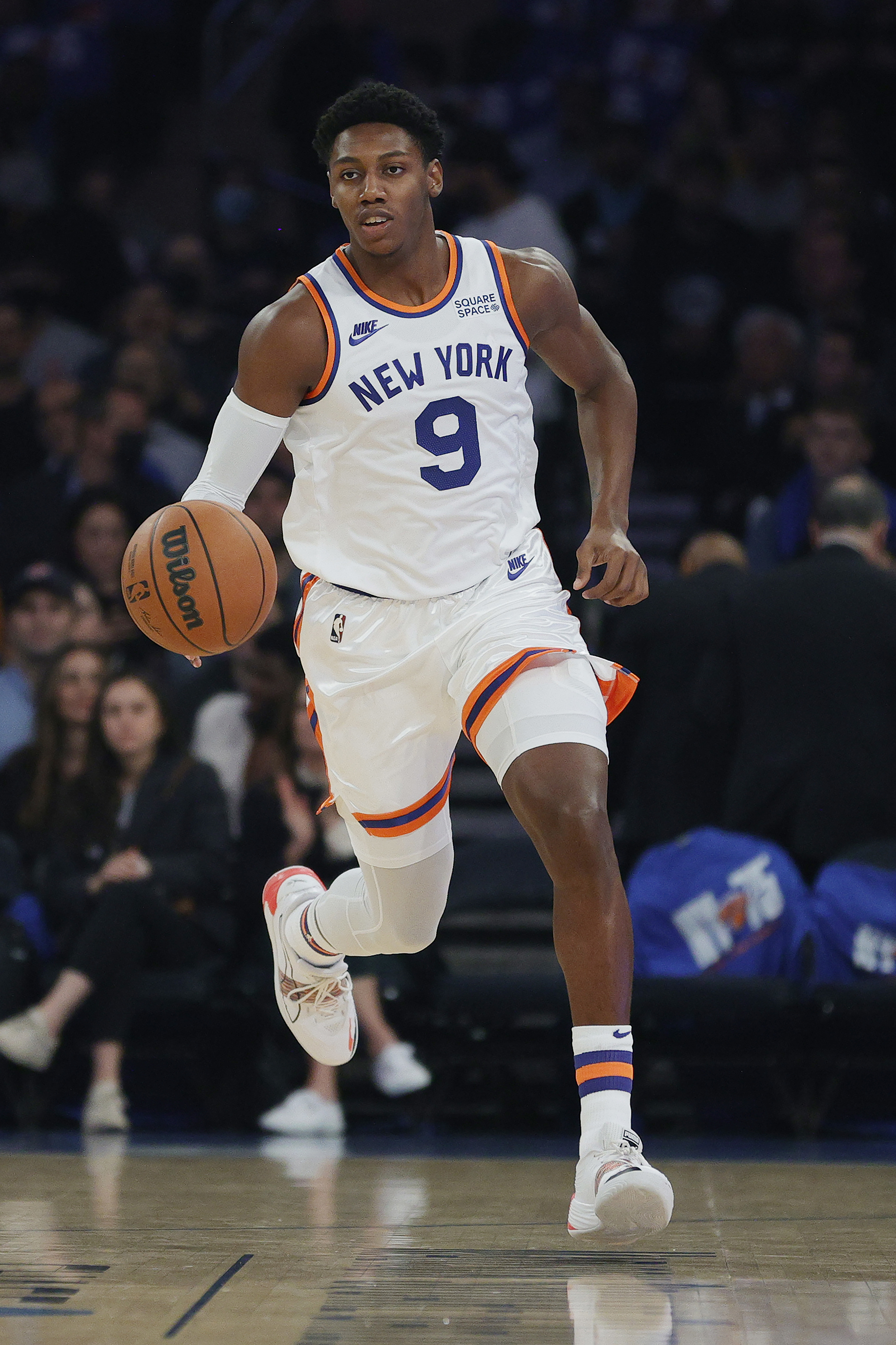 RJ Barrett runs on the court for the New York Knicks.