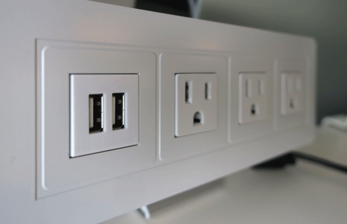 Stock image of an electrical outlet.