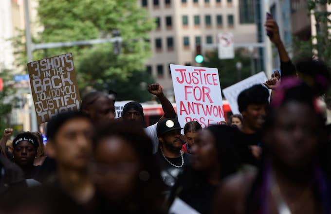 Protestors at a rally asking for justice for Antwon Rose.