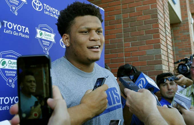 Ereck Flowers speaks with reporters.