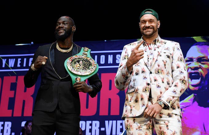Deontay Wilder and Tyson Fury get together during a news conference at The Novo Theater.