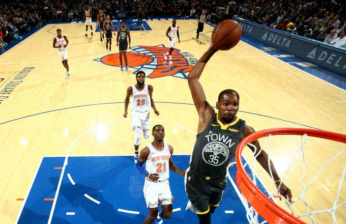 Kevin Durant #35 of the Golden State Warriors dunks the ball