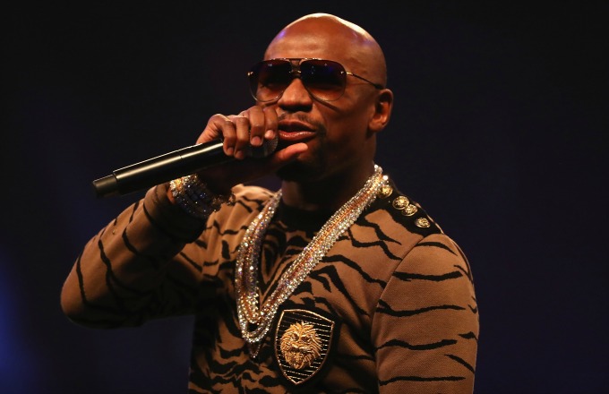 Floyd Mayweather talks trash during his promo tour with Conor McGregor.