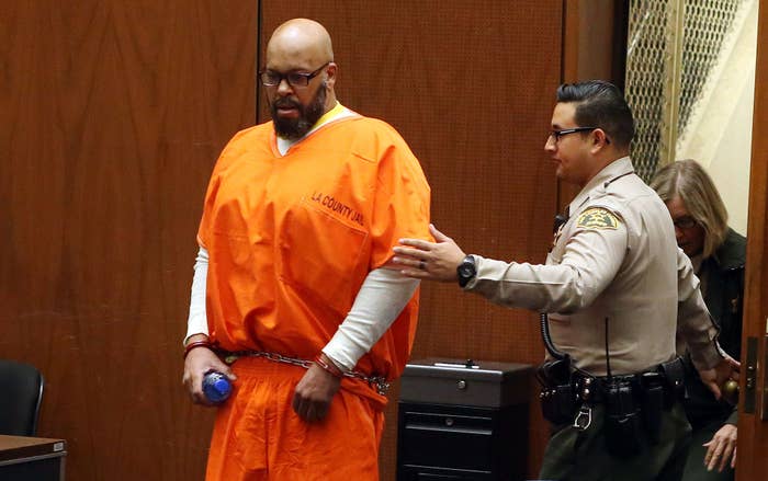 Suge Knight enters Los Angeles Superior Court for his arraignment on October 27, 2015